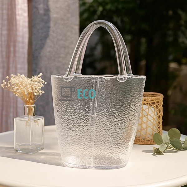 Скляна ваза-сумочка прозорого кольору, 19.5×7.3×29 см (9 ... Скляна ваза-сумочка прозорого кольору, 19.5×7.3×29 см (9 ...